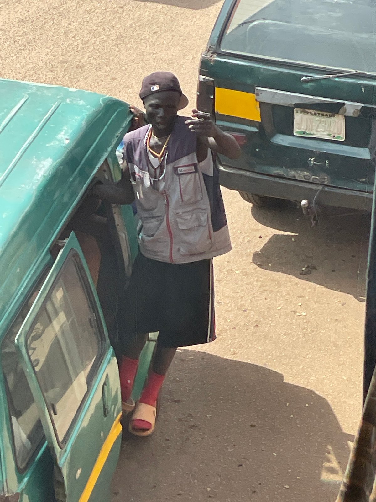Everyday street life and commerce in a busy African urban setting