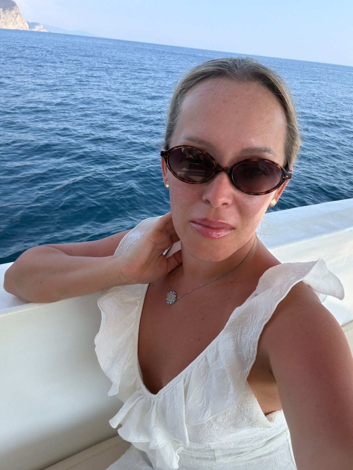 Afternoon on the Montenegrin coast: boats, cliffs, and open roads