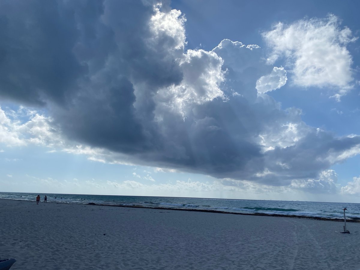 Beach scene documented in Playa del Carmen with footprints