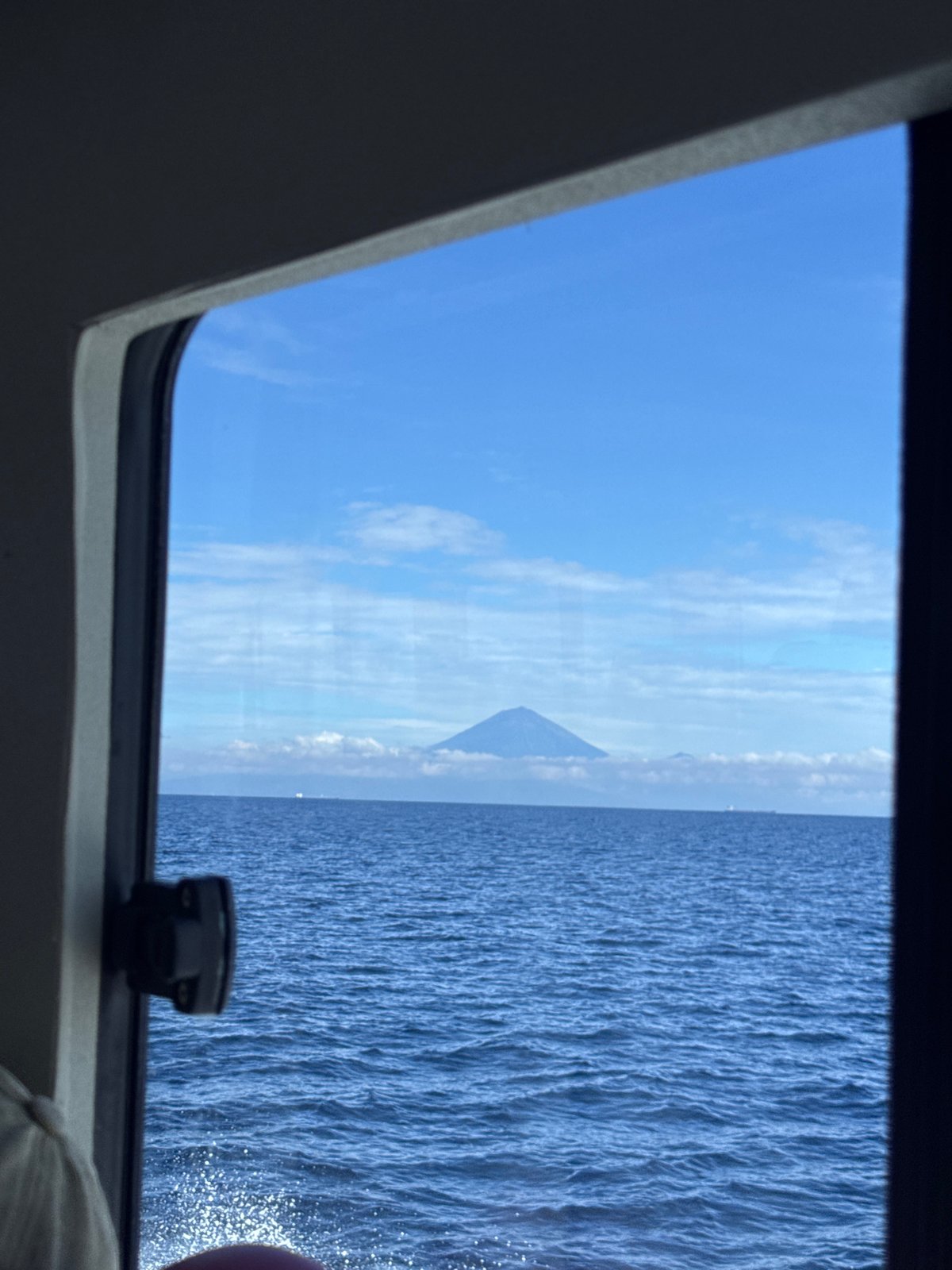 Ocean view captured from boat window in Indonesian waters