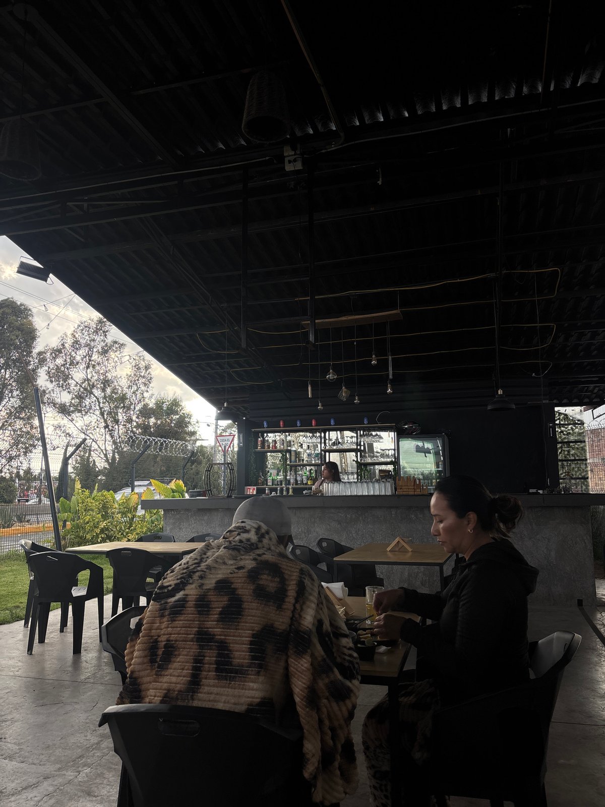 Open-air restaurant documented in San Pedro Cholula evening