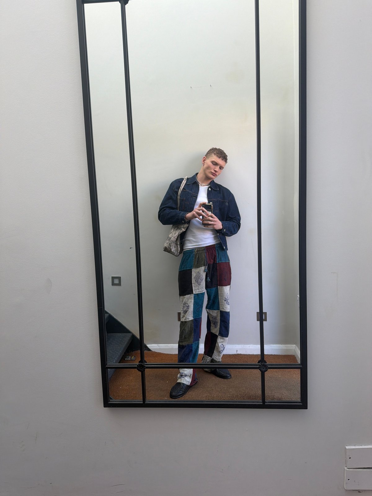 Morning mirror selfies captured in London indoor location