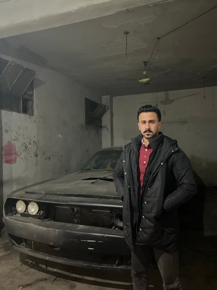 Damascus residents document motorcycle scenes, garage work during evening hours