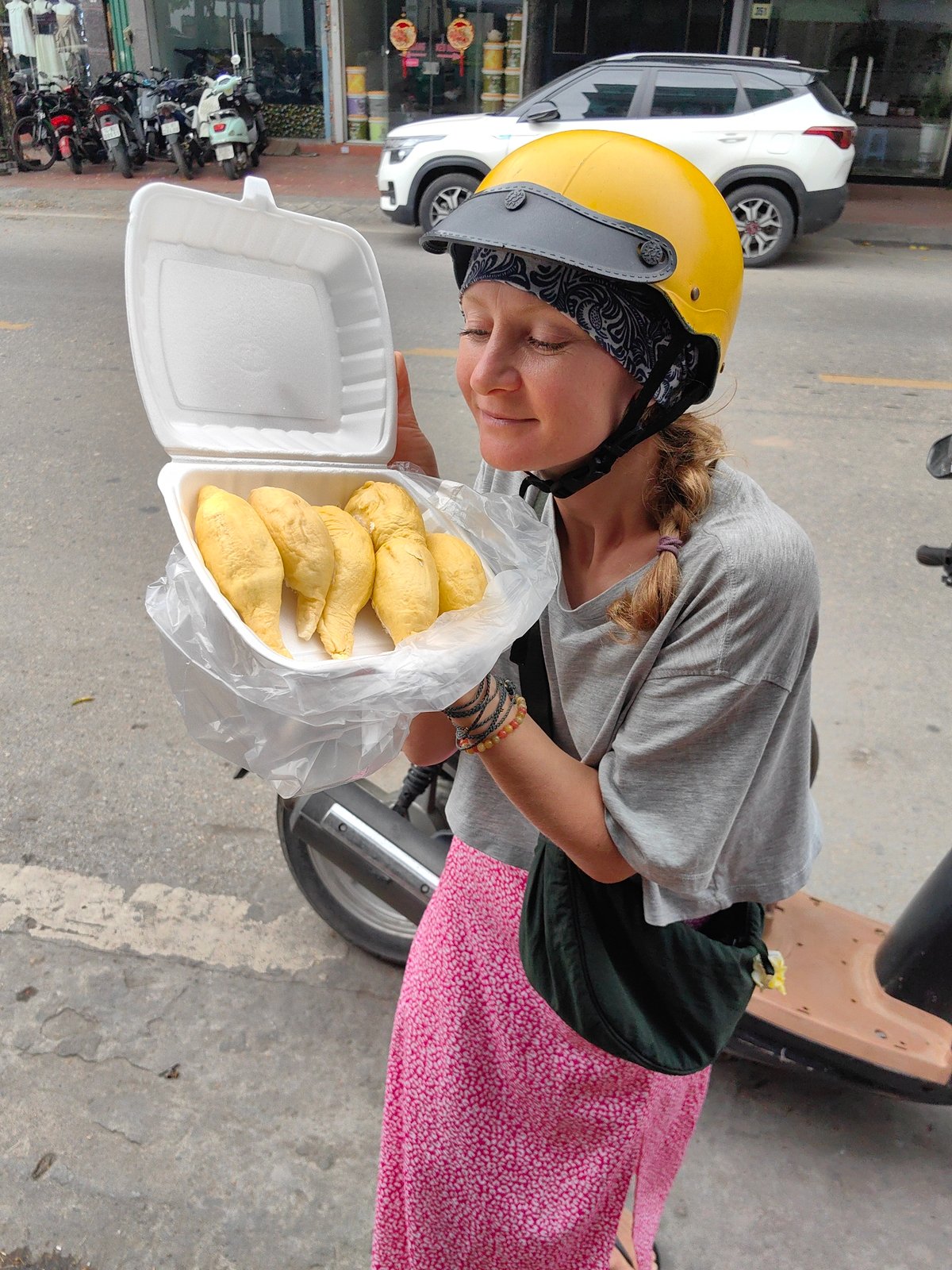 Woman with food container observed in Vietnamese ward