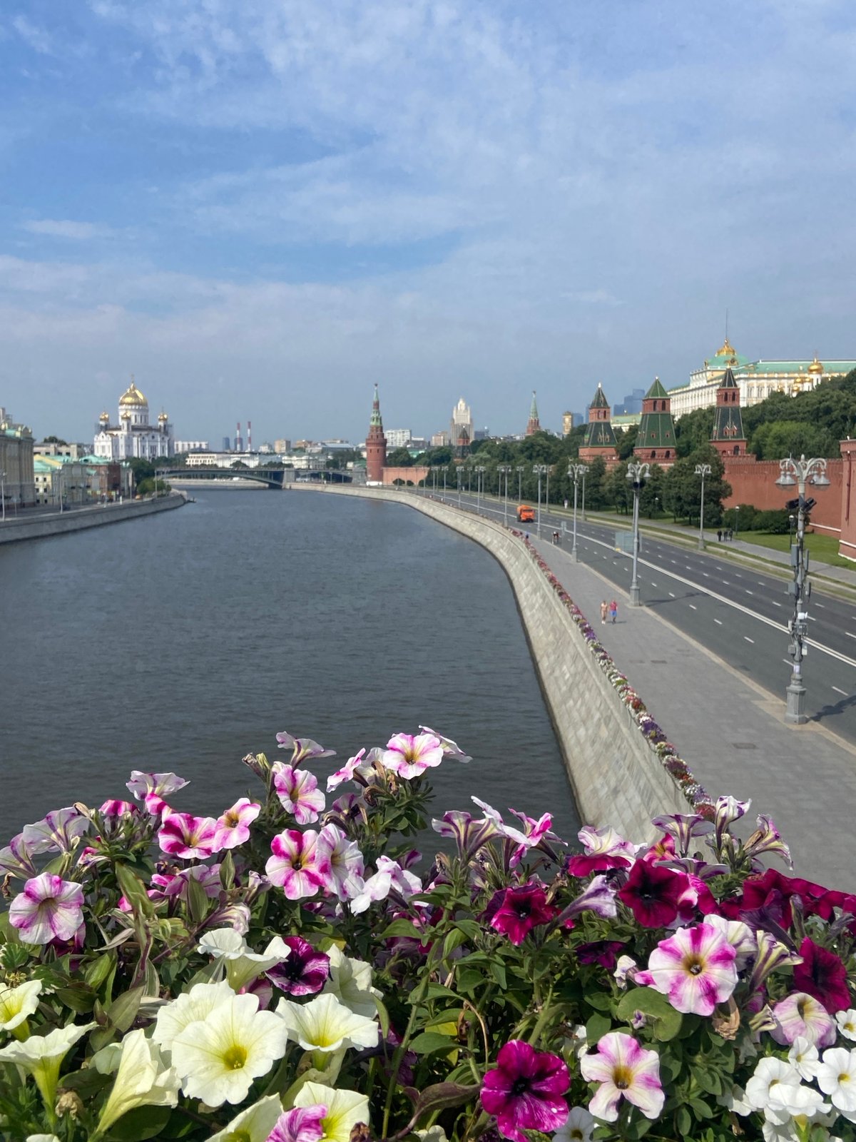 Moscow's iconic landmarks framed by summer flower beds