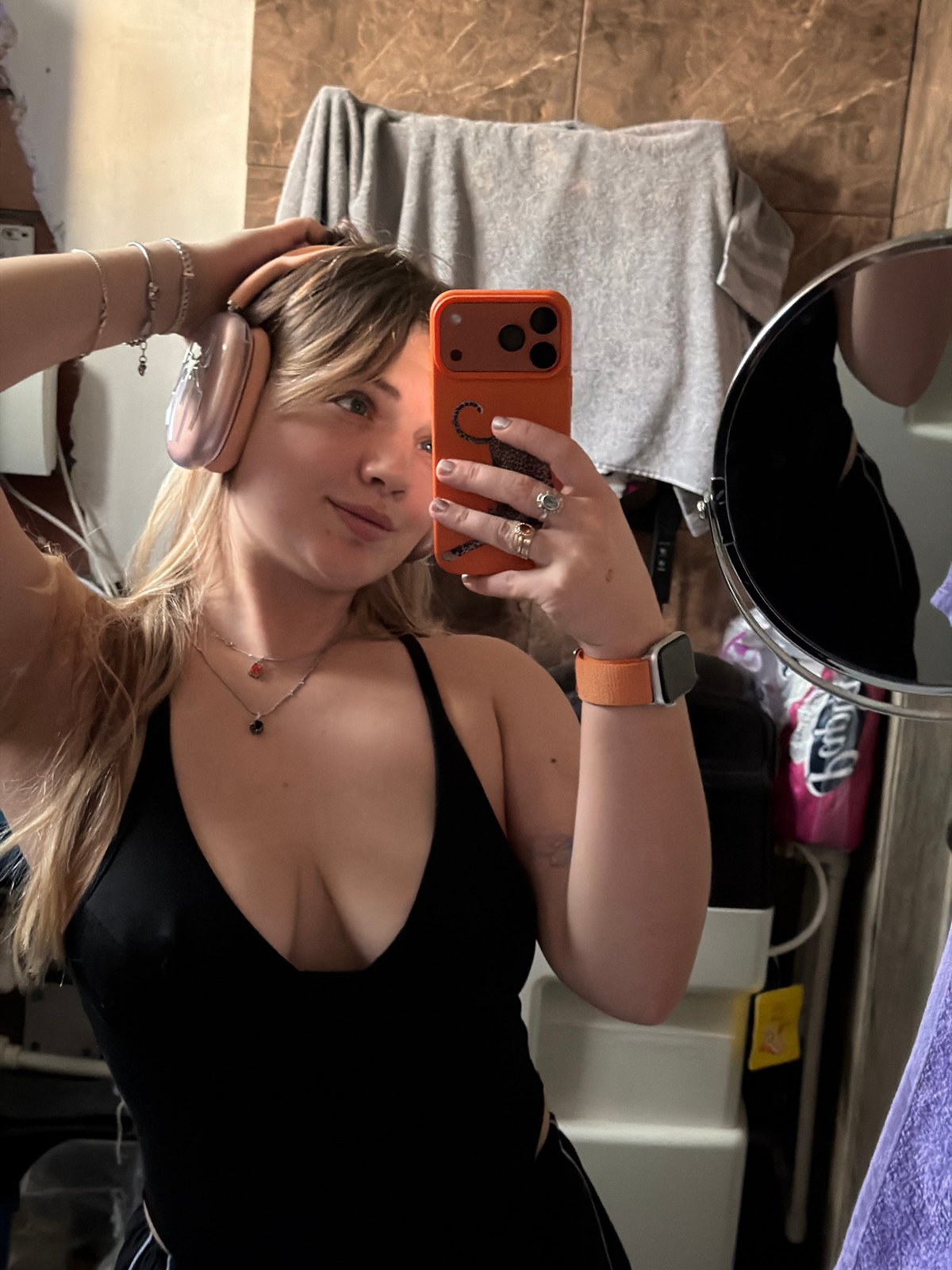 Woman takes multiple mirror selfies in Большая Шильна, Russia