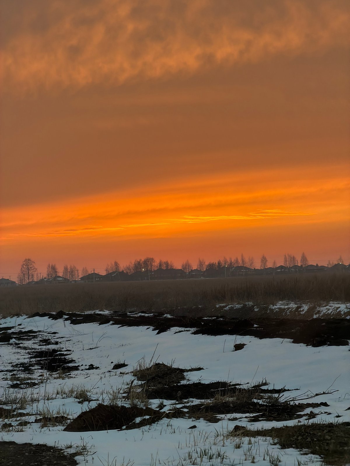 Sunset captured over rural landscape in Большая Шильна, Russia