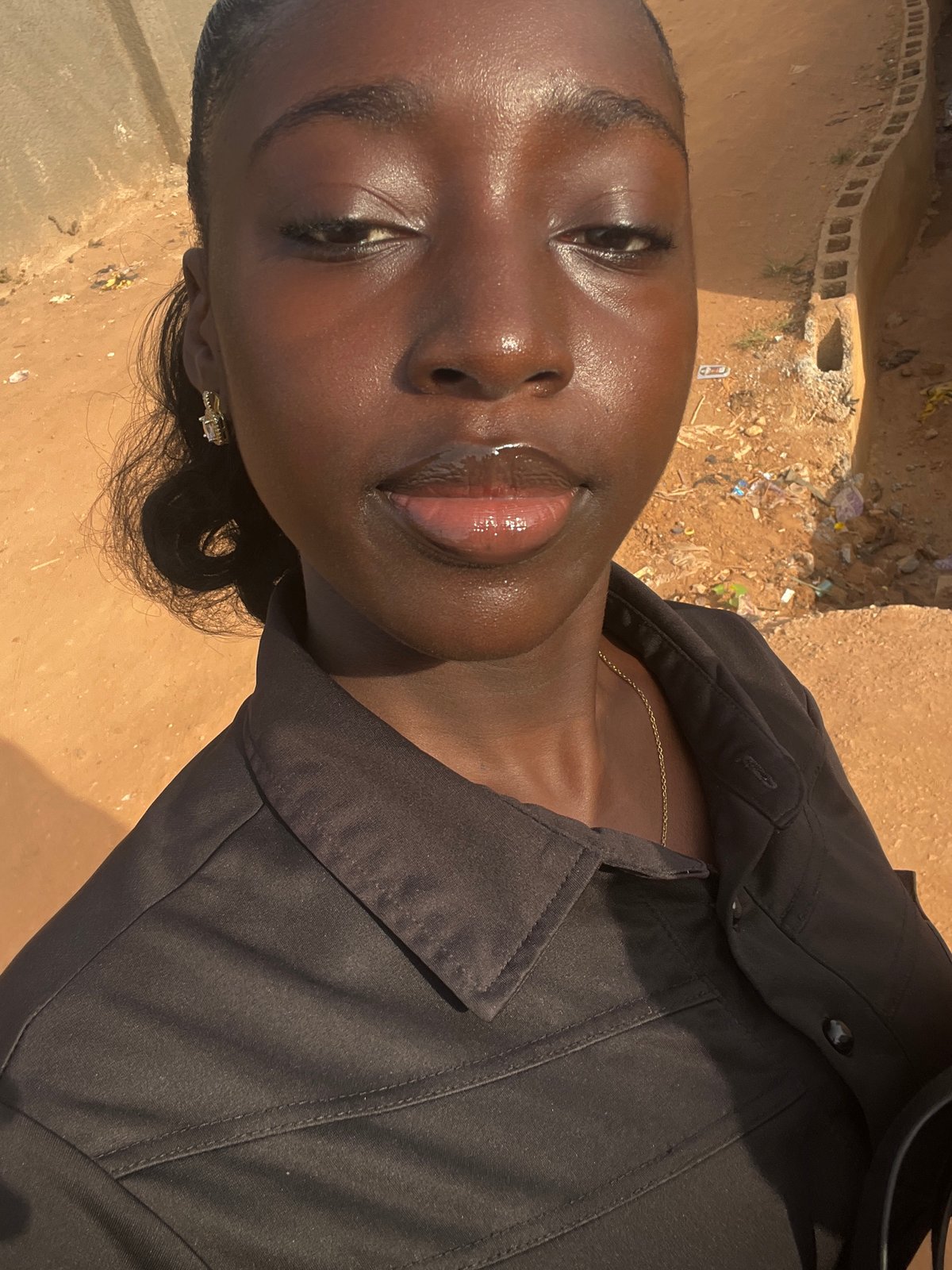 Morning street life documented in residential Abuja neighborhood