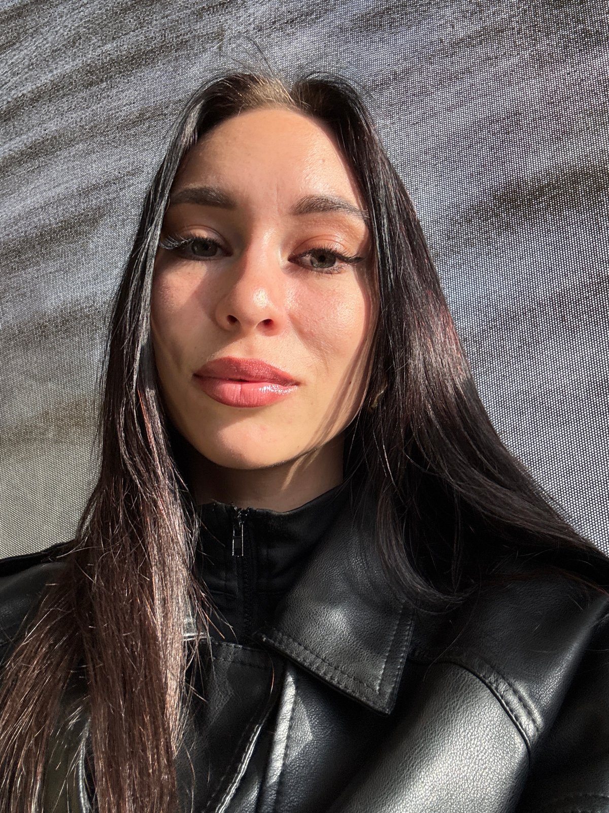 Woman photographed in close-up portrait in Chaikovsky, Russia