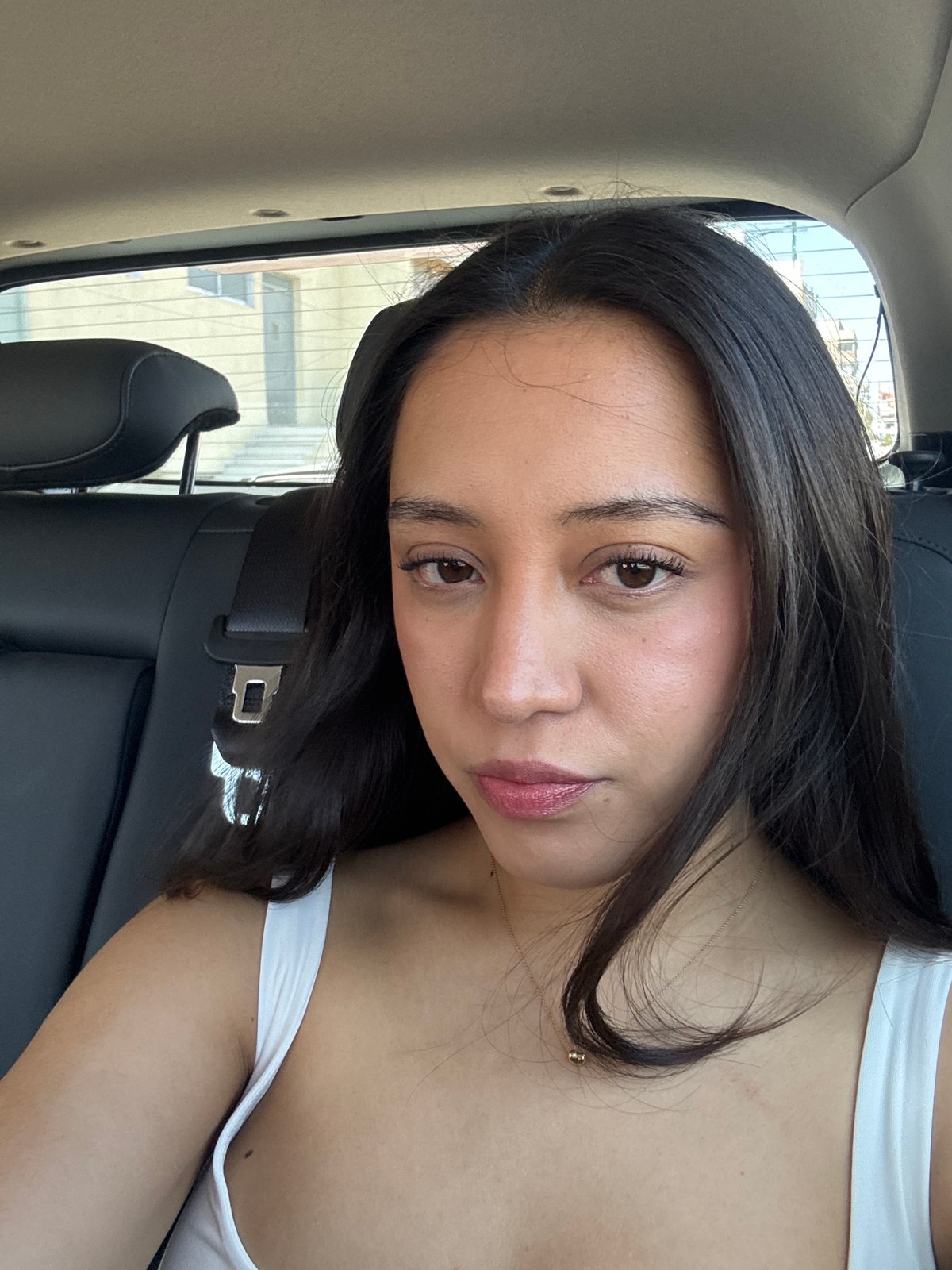 Woman observed sitting in car in urban Puebla