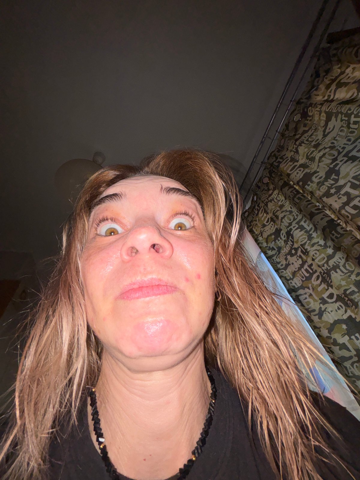 Woman documents domestic life through selfies and casual moments