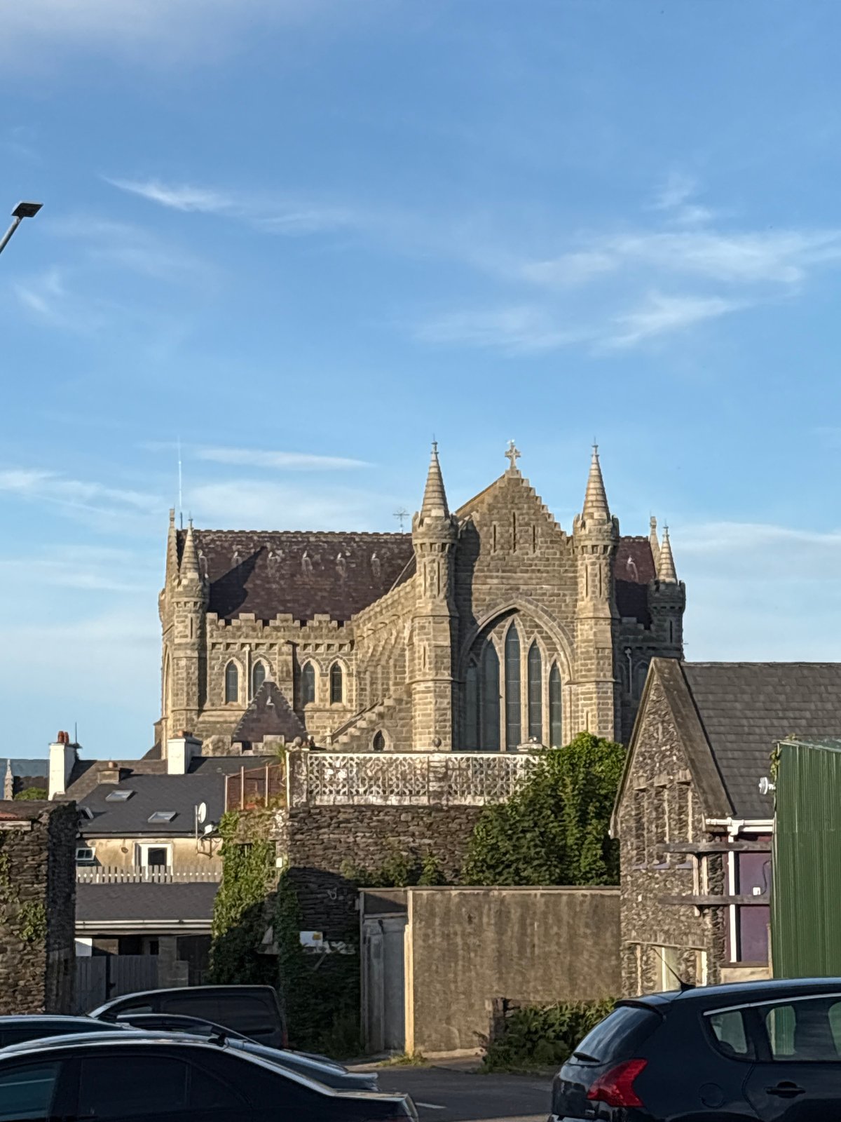 Stone church and ancient tower in Cahersiveen, Ireland