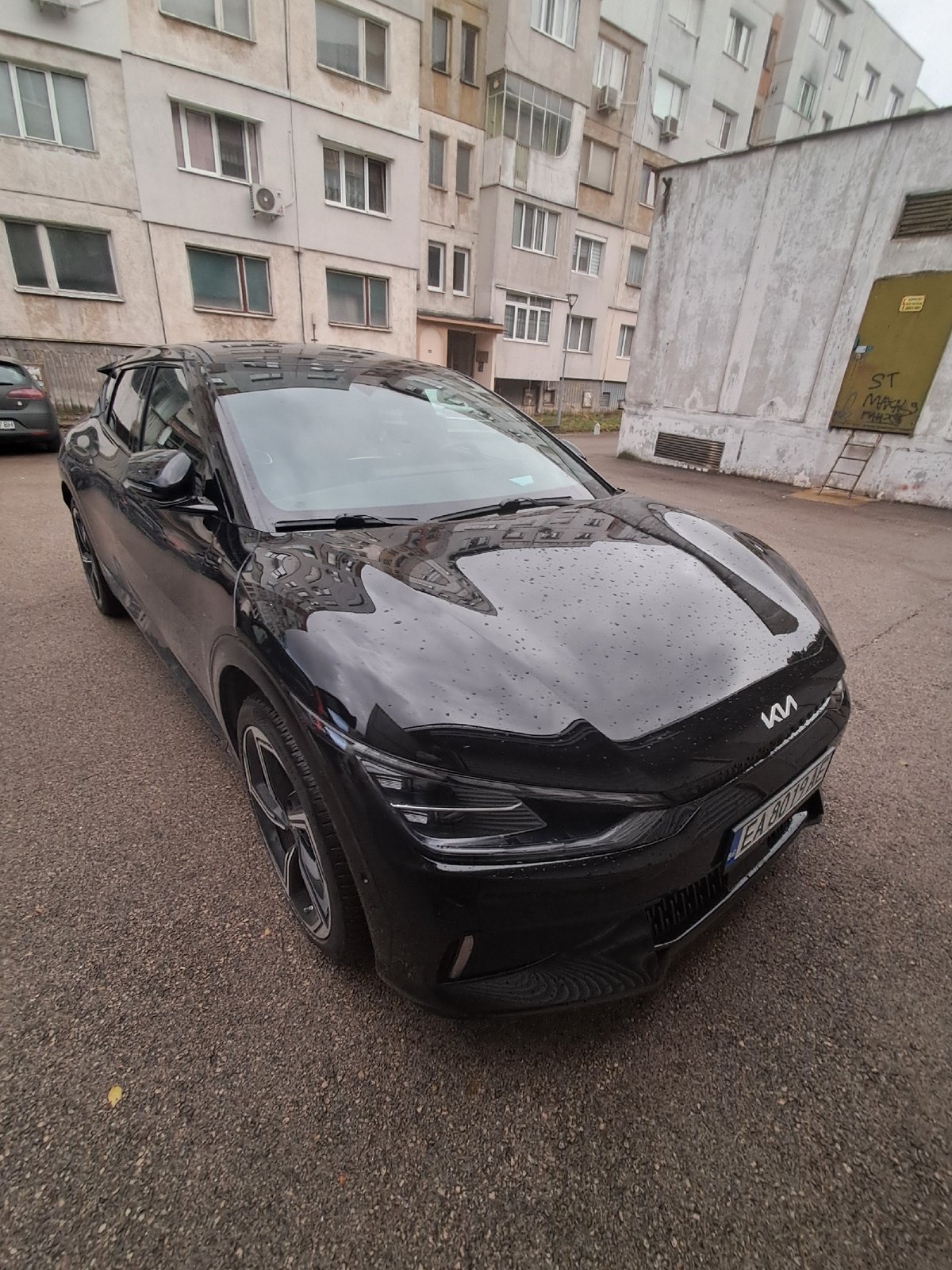 Everyday scenes documented in Gabrovo: parked car, dartboard