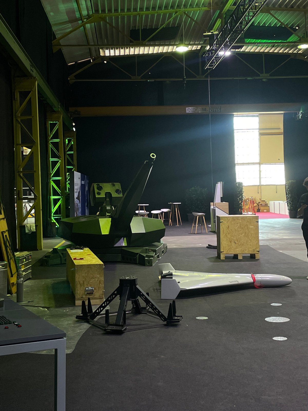 Military equipment exhibition displays anti-aircraft gun and missile
