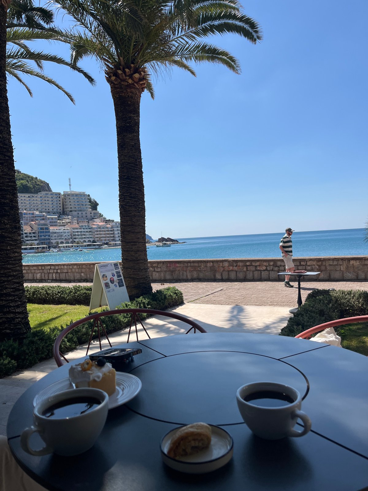 Coffee served at seaside cafe in Rafailovići, Montenegro