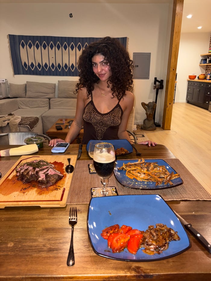 Woman photographed at dining table in Los Angeles home