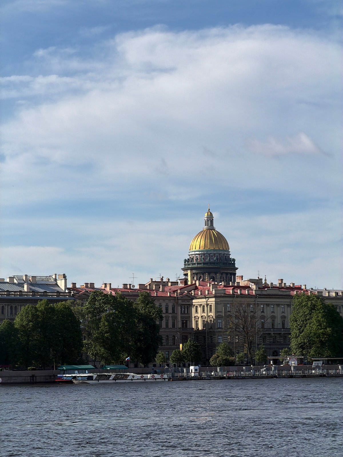 Tourist documents Saint Petersburg landmarks during early morning walk