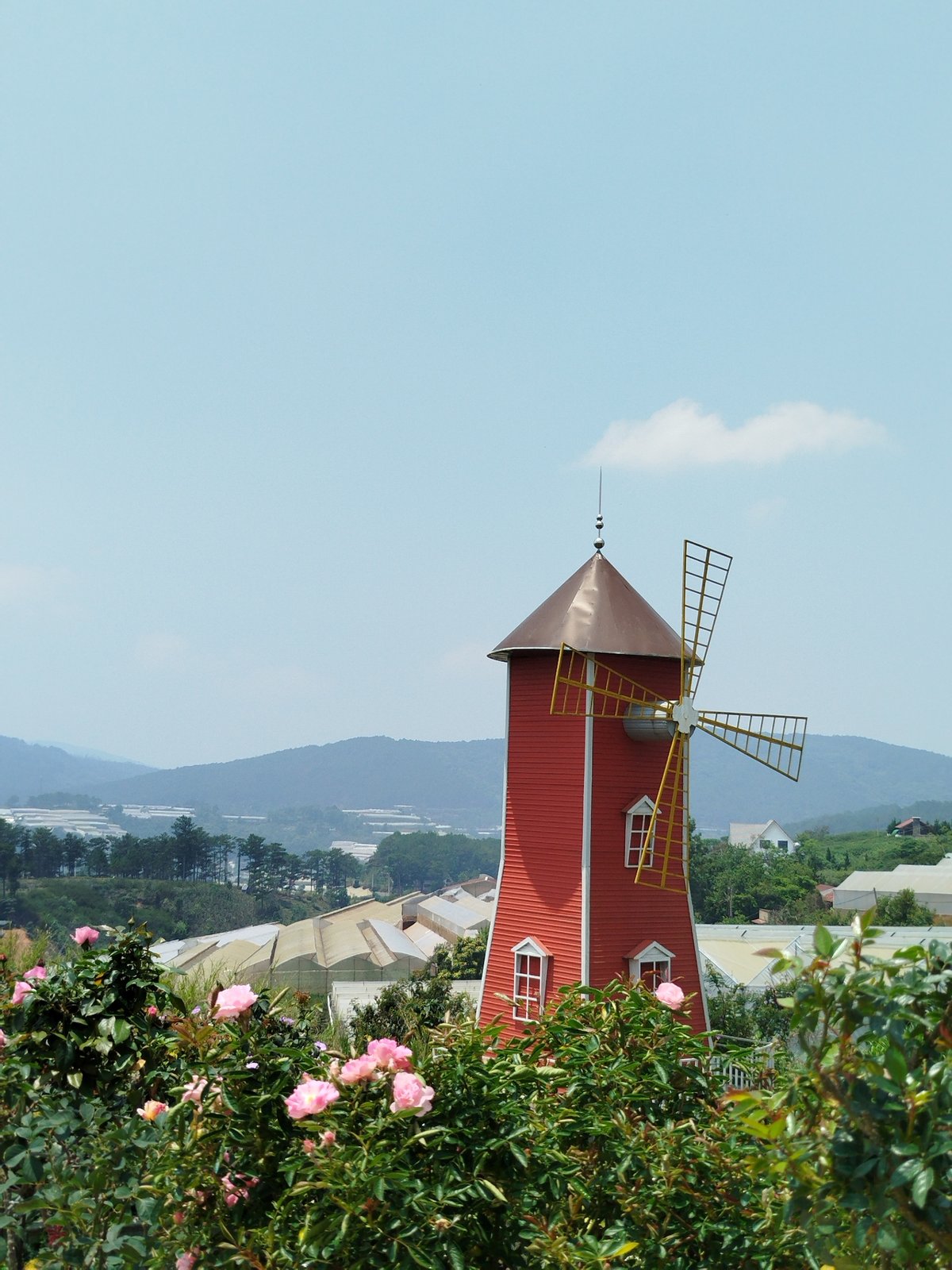 European-style windmill and buildings captured in Đà Lạt gardens
