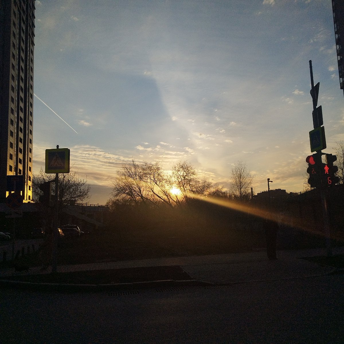 Urban street scene captured during low sun backlighting conditions
