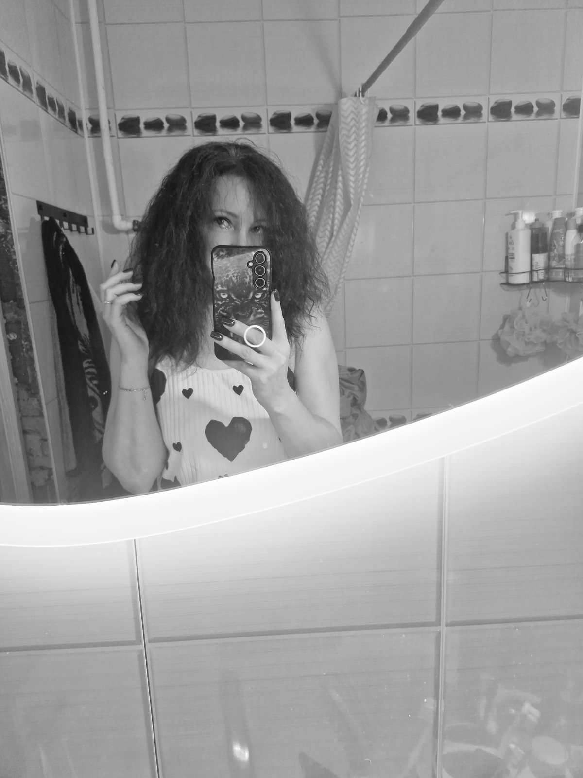 Woman takes late-night selfies in Марковский, Russia home