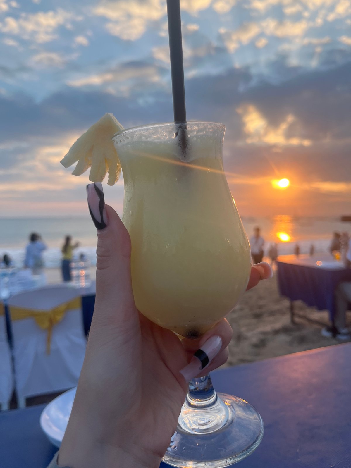 Drinks and a pastel sunset at Kuta Beach