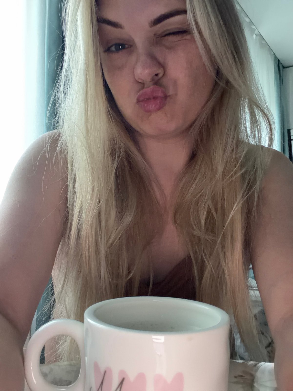 Morning coffee moment captured alongside crane truck in Votkinsk