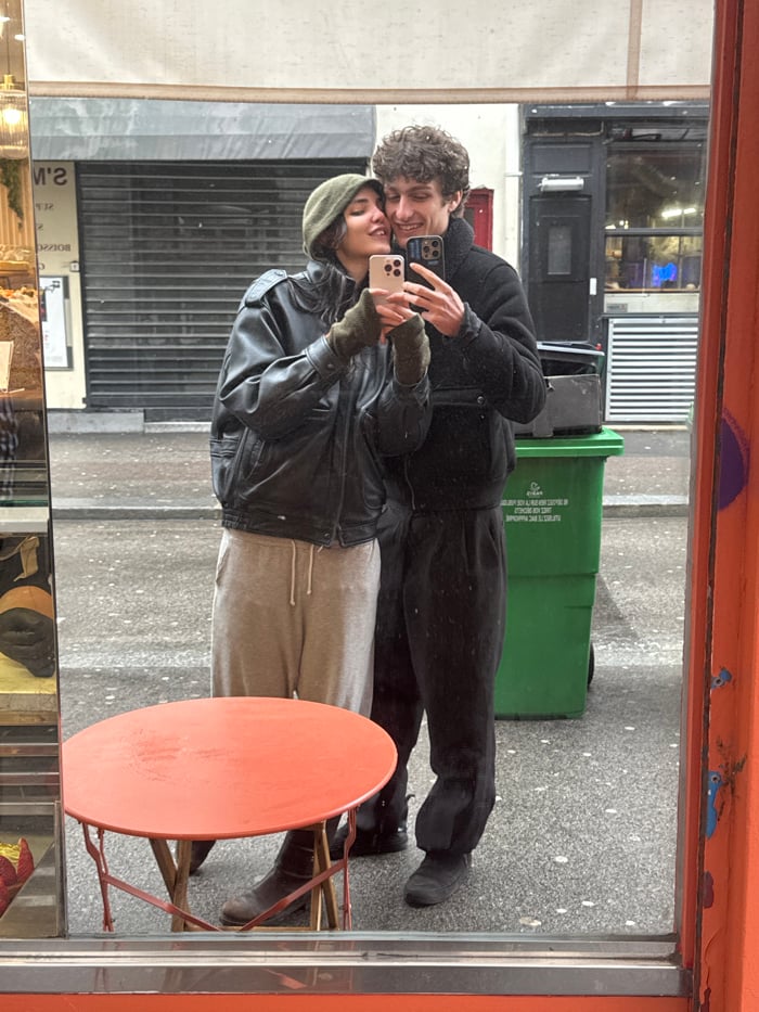 Couple Takes Mirror Selfies Across Paris Streets