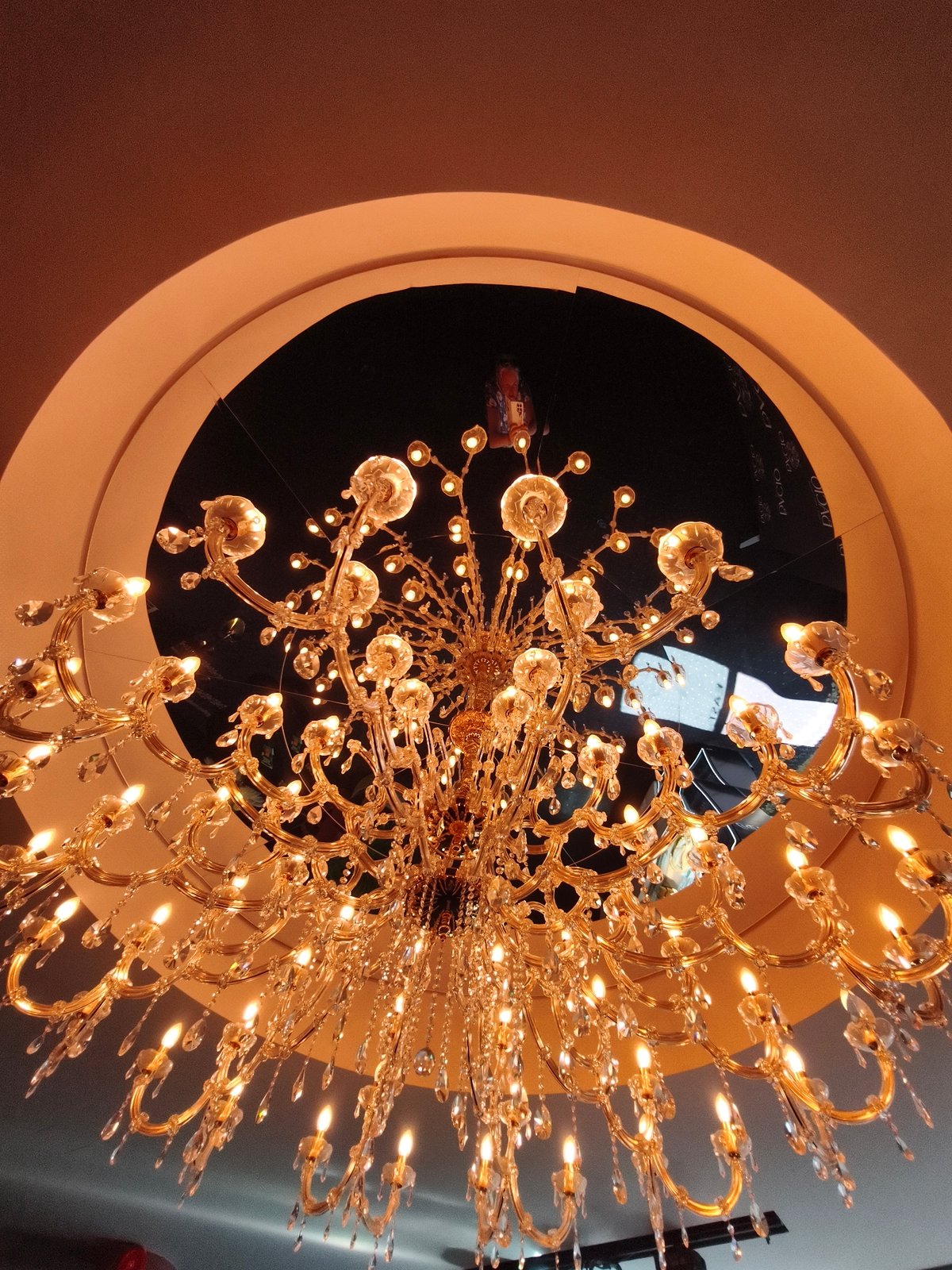 Chandelier close-ups, a passing tram, and a flower-lined terrace in Tallinn
