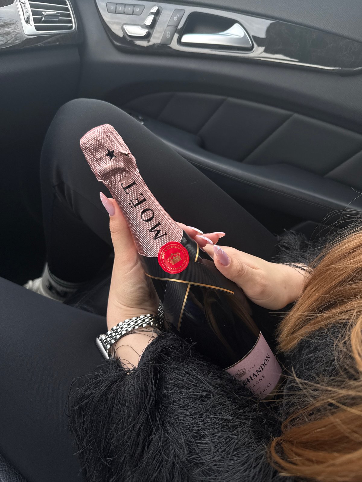 Woman with champagne bottle spotted in car in Plovdiv
