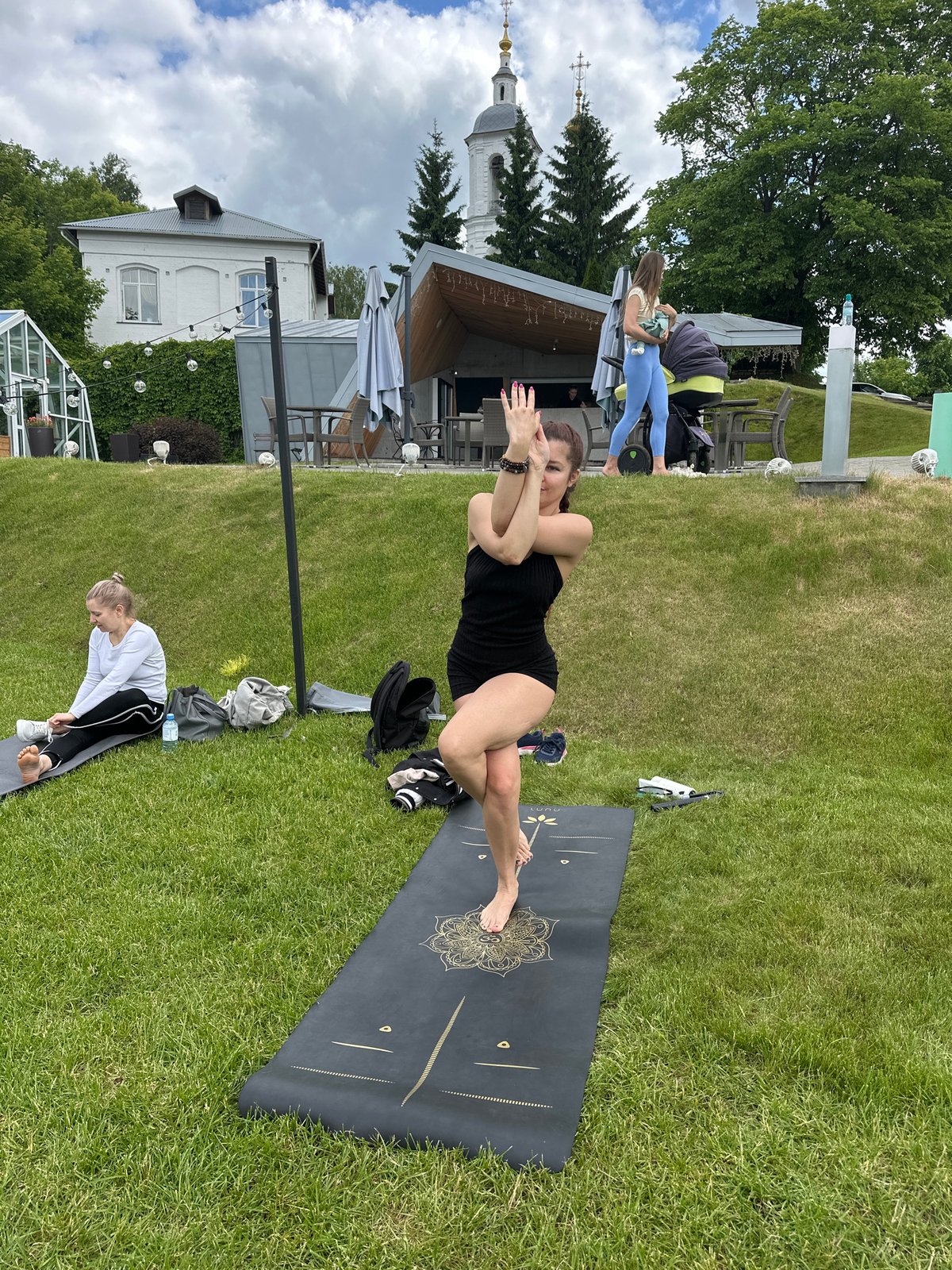 Morning yoga session documented in Vladimir, Russia park