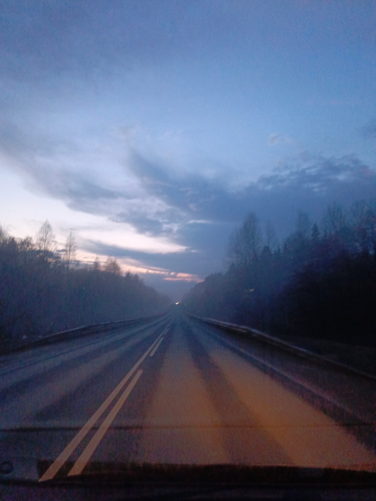 Twilight road scene captured in Chaikovsky, Russia