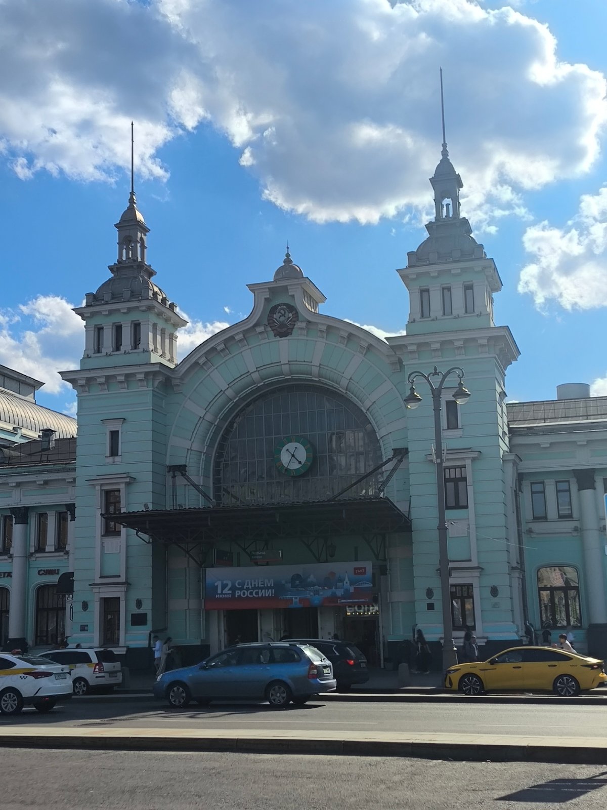 Traveler documents train journey through urban landscapes June 2026