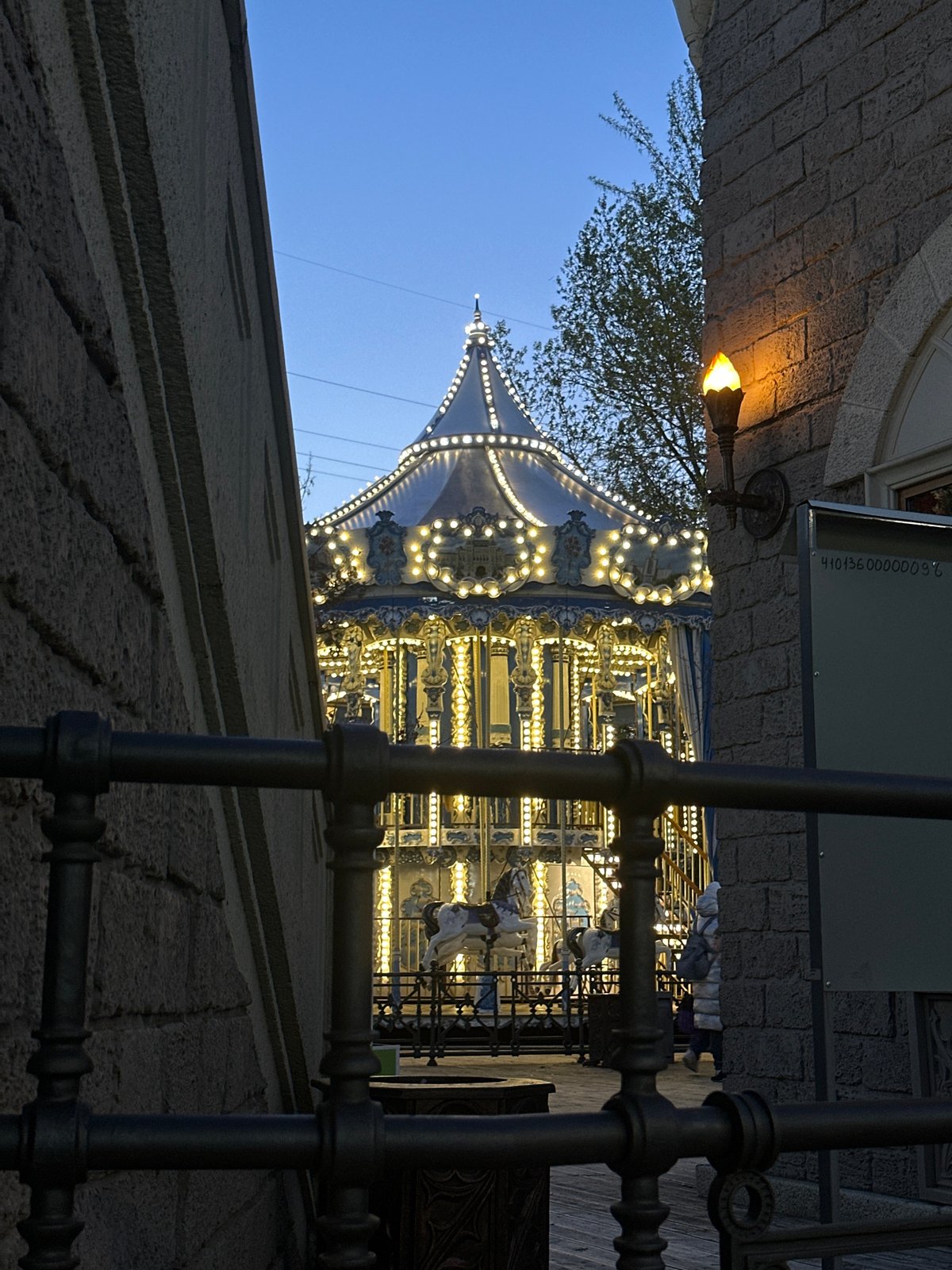 Evening carousel rides captured in Moscow's architectural district