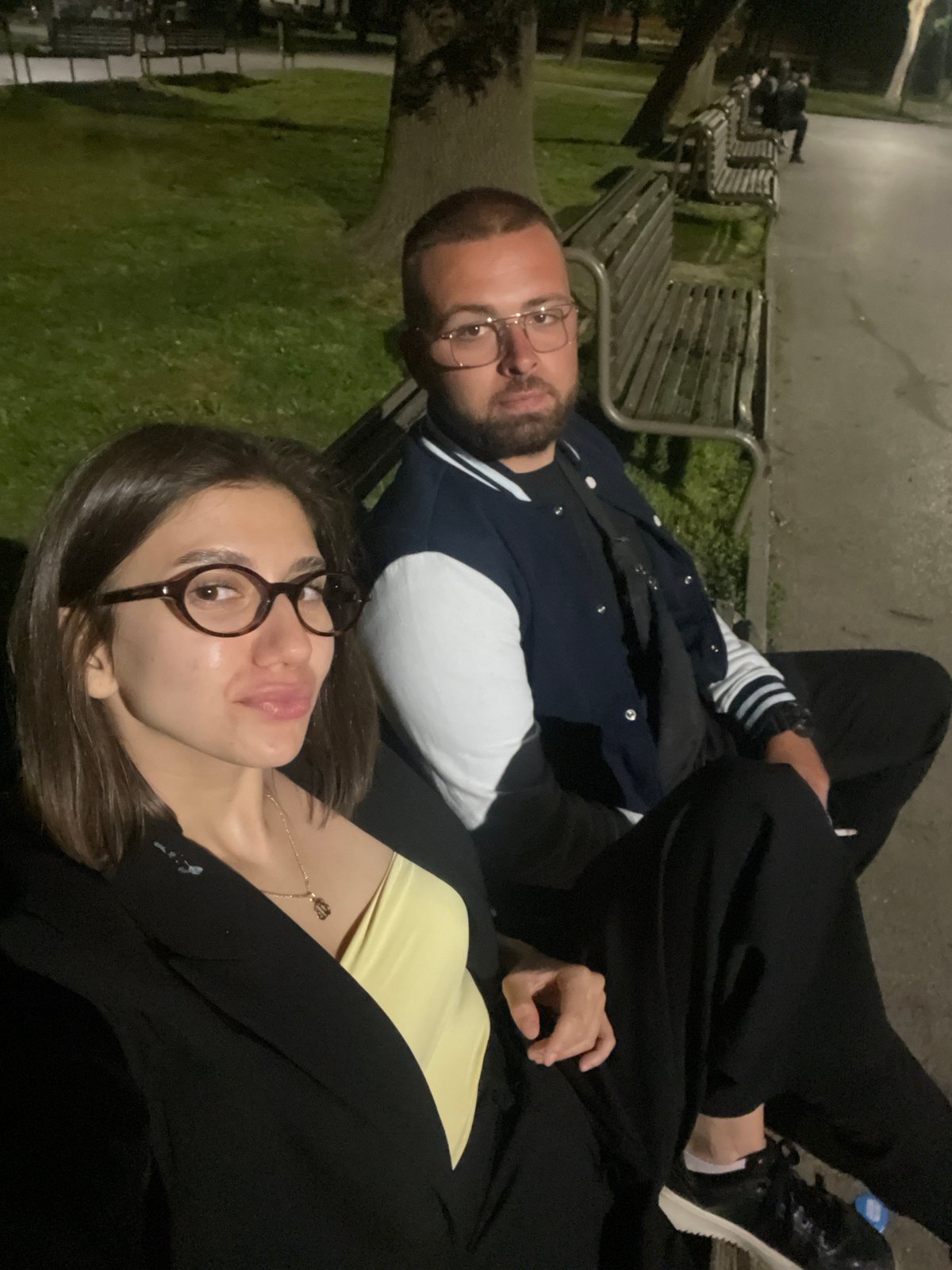 Couple relaxes in Sofia park during evening hours