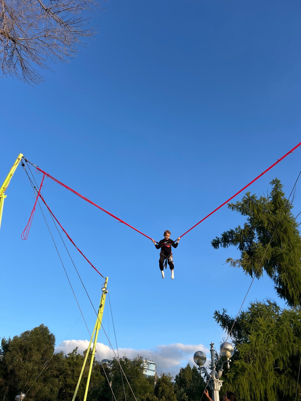 Bungee trampoline ride mid-air in Novokuybyshevsk