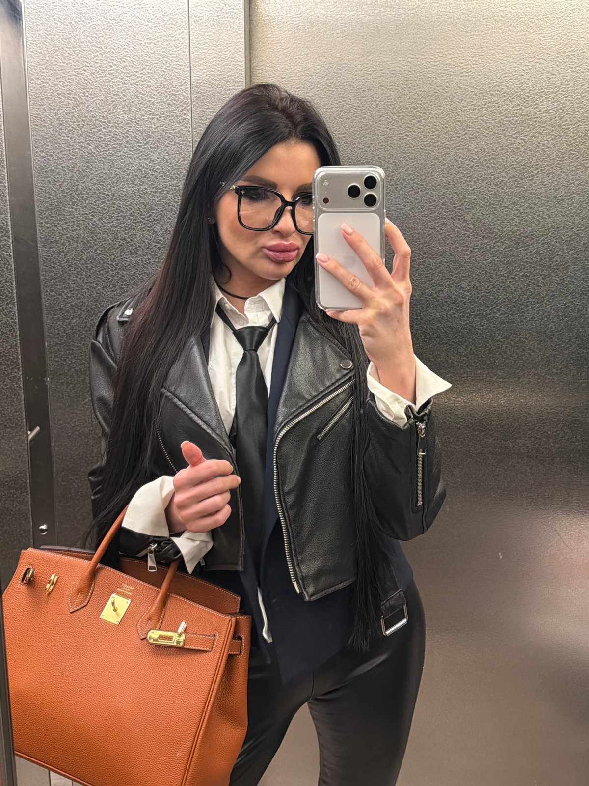 Woman takes elevator selfie amid overcast day in Voronezh