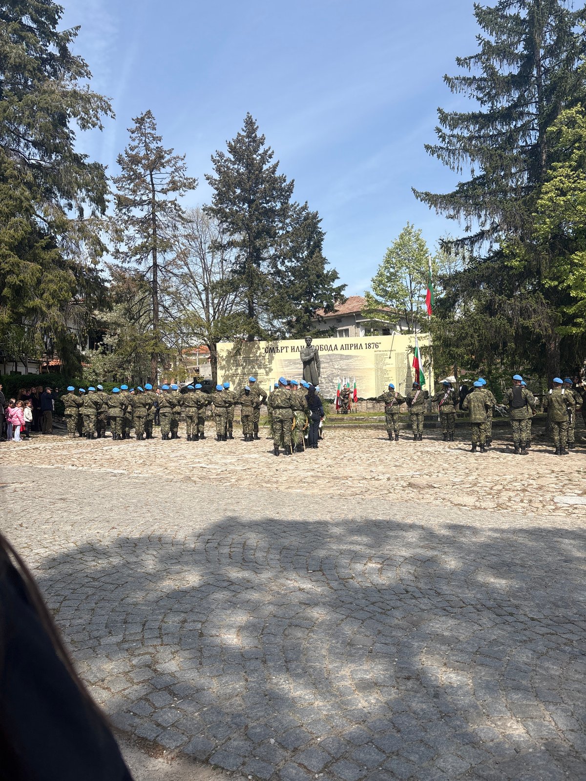Military band performs at outdoor ceremony in Strelcha, Bulgaria