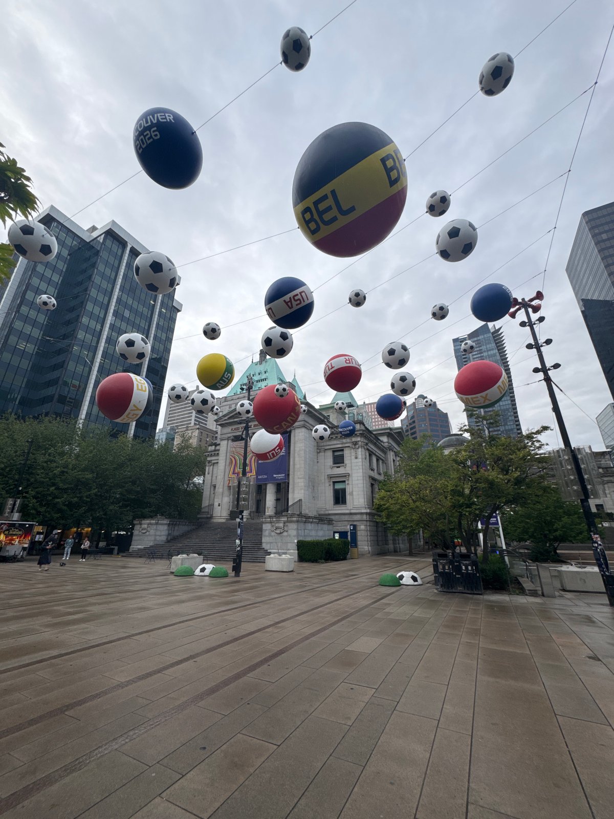 Downtown Vancouver plaza features giant suspended soccer ball decorations