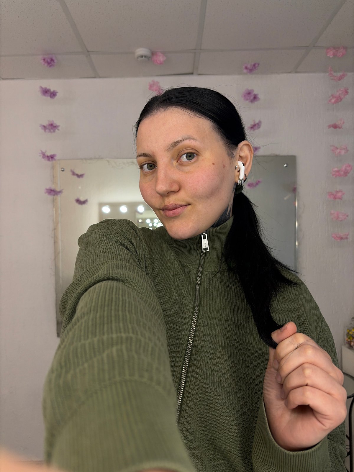 Woman documents morning routine with selfies and breakfast in Chaikovsky