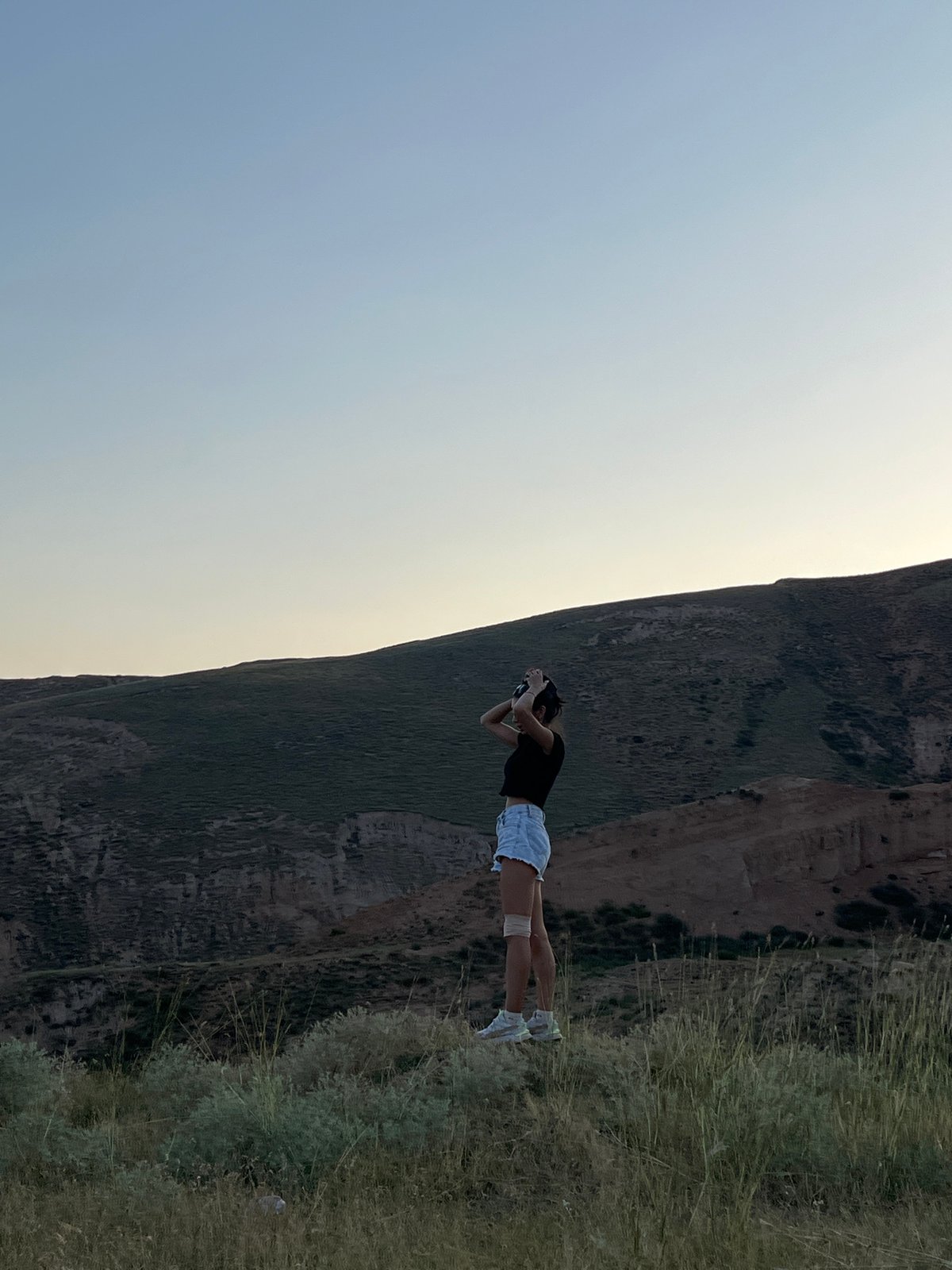 Exploring the arid hills outside Mailuu-Suu City, Kyrgyzstan