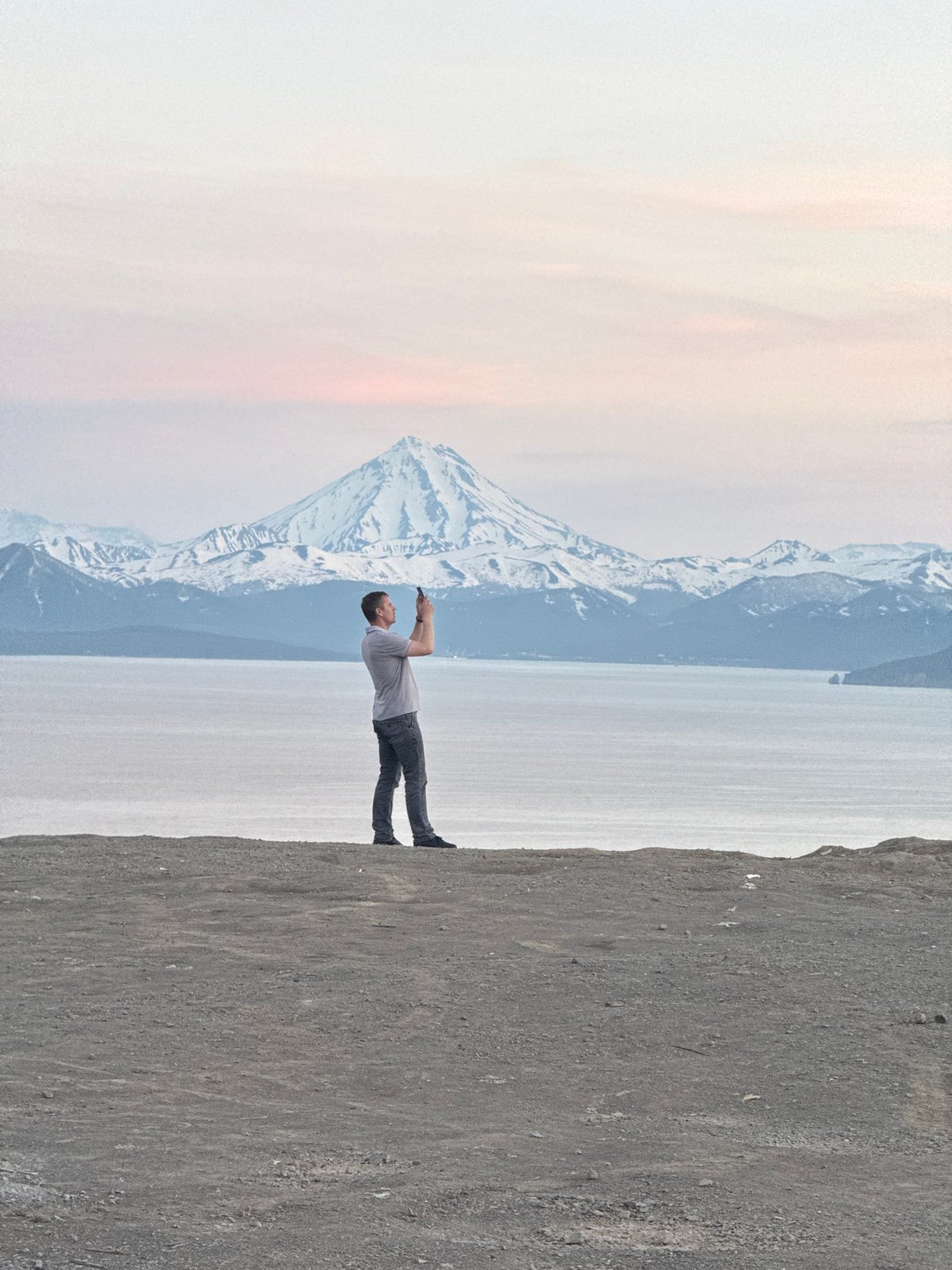Taking in Kamchatka's volcanic landscape from a dirt bluff
