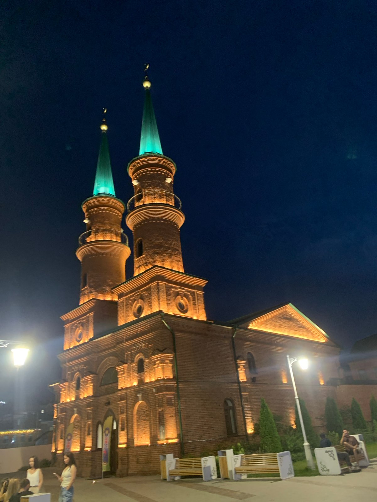 Kul Sharif Mosque glowing under warm lights at night