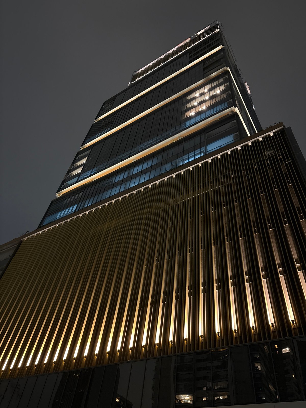 São Paulo streets at night — towers, murals, and city motion