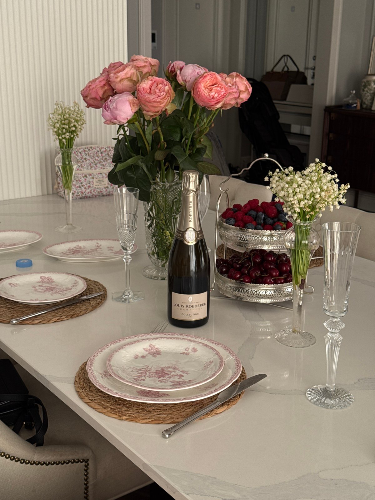 Elegant dinner party preparation captured in upscale Moscow home