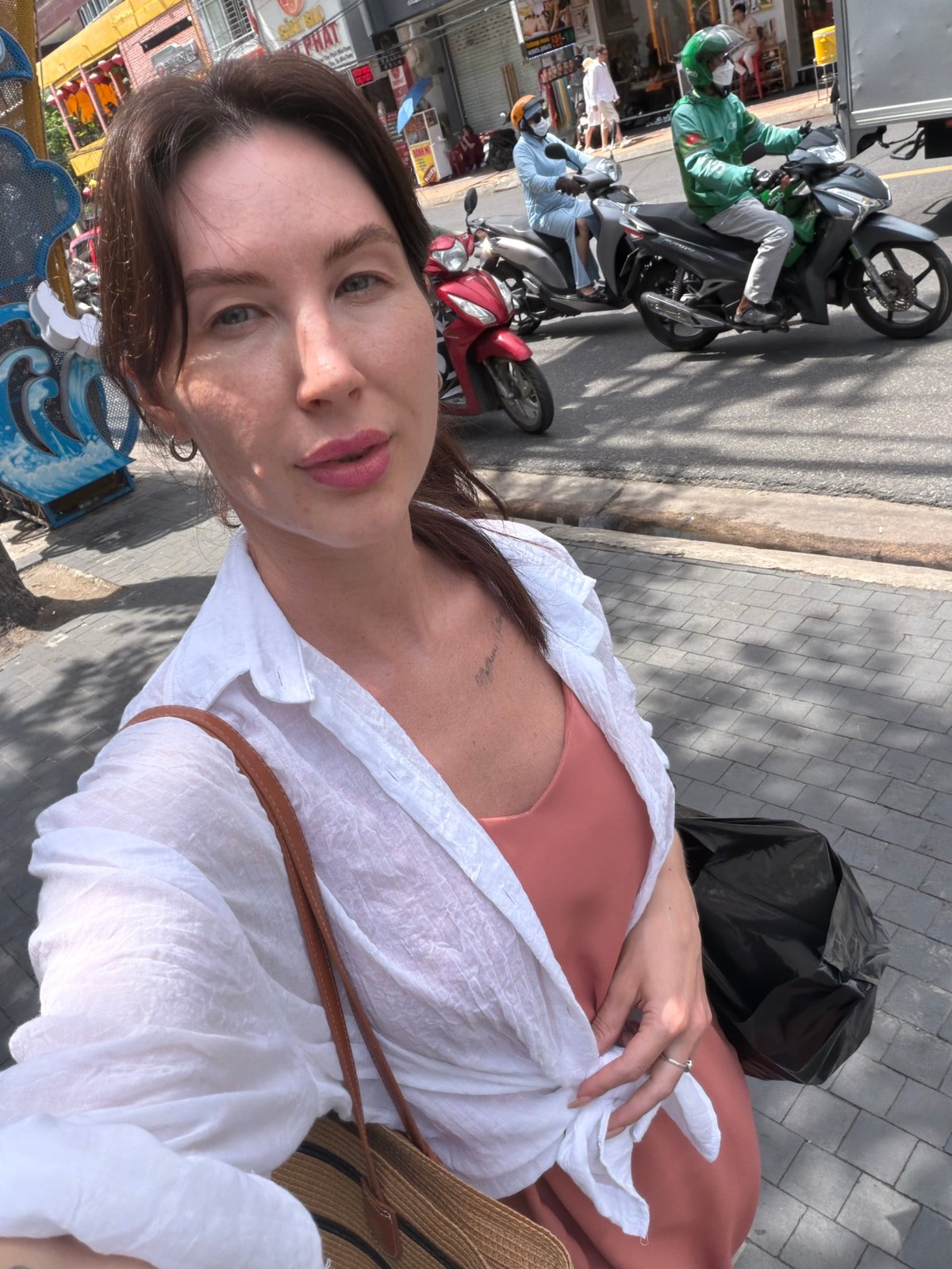 Tourist documents morning exploration of Nha Trang, Vietnam cafes