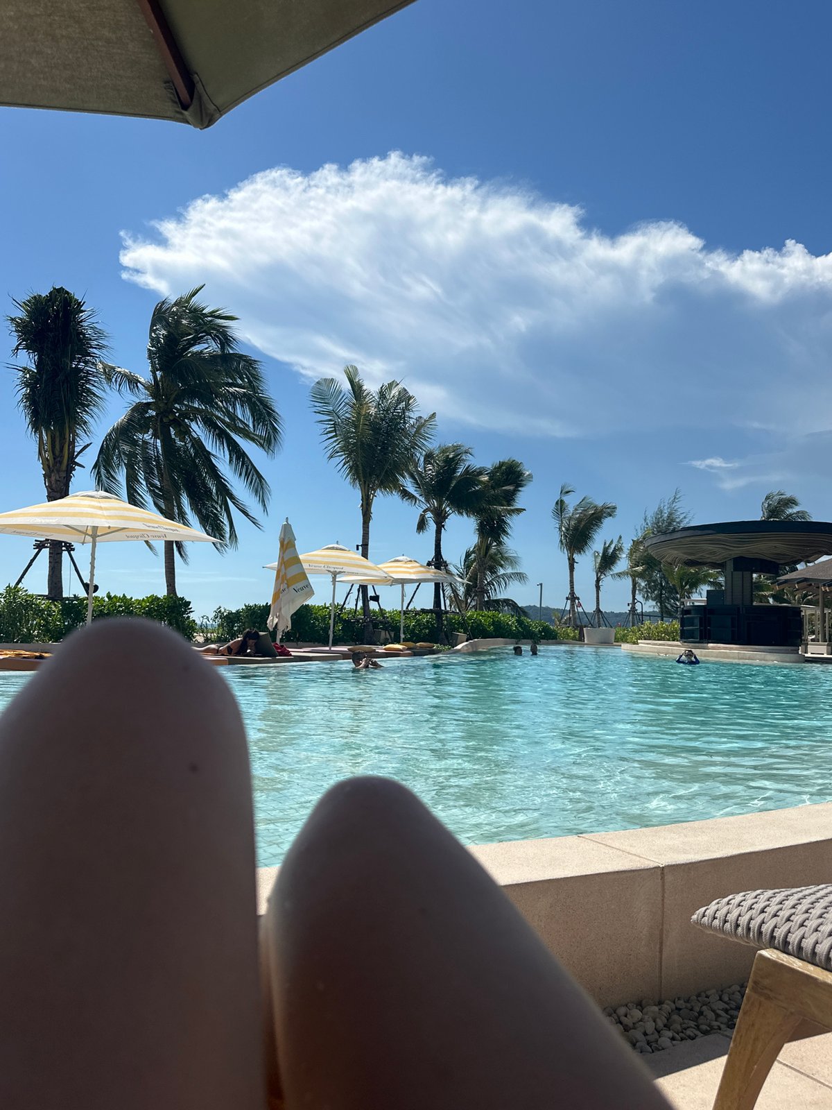 Resort poolside leisure activities documented during morning hours