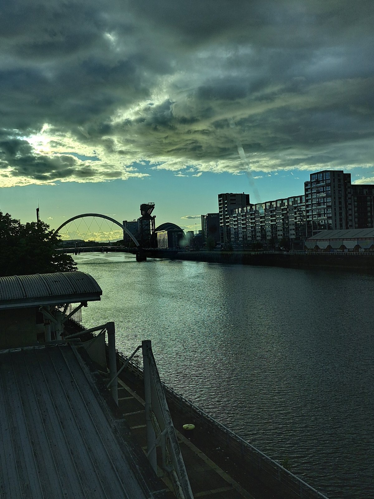 River Clyde scene captured featuring Arc bridge and Finnieston Crane