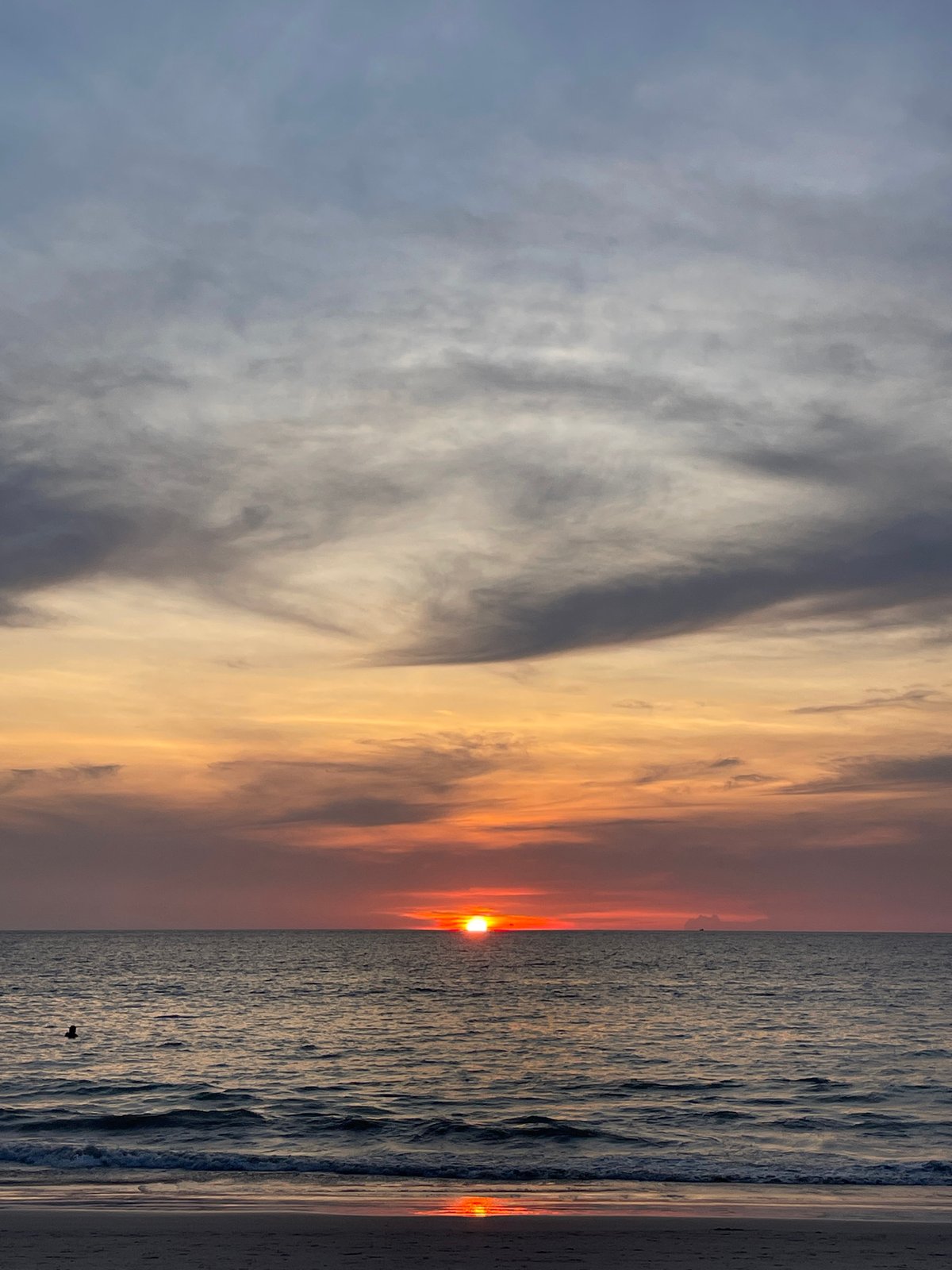 Beach day documented in Choeng Thale with wildlife and snacks