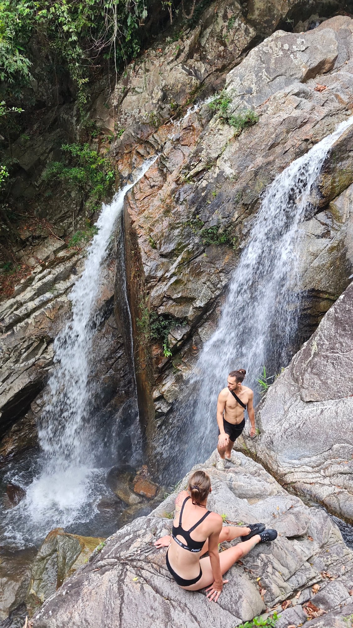 Visitors enjoy waterfall recreation near Đà Nẵng Vietnam