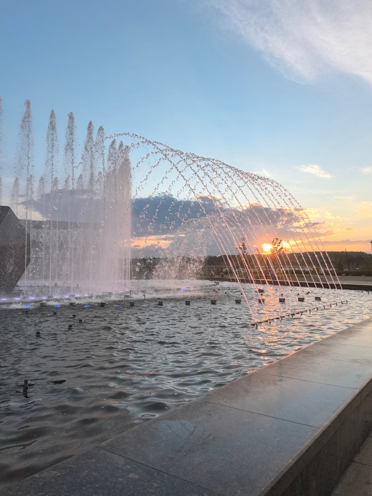 Magnitogorsk plaza fountain at golden hour